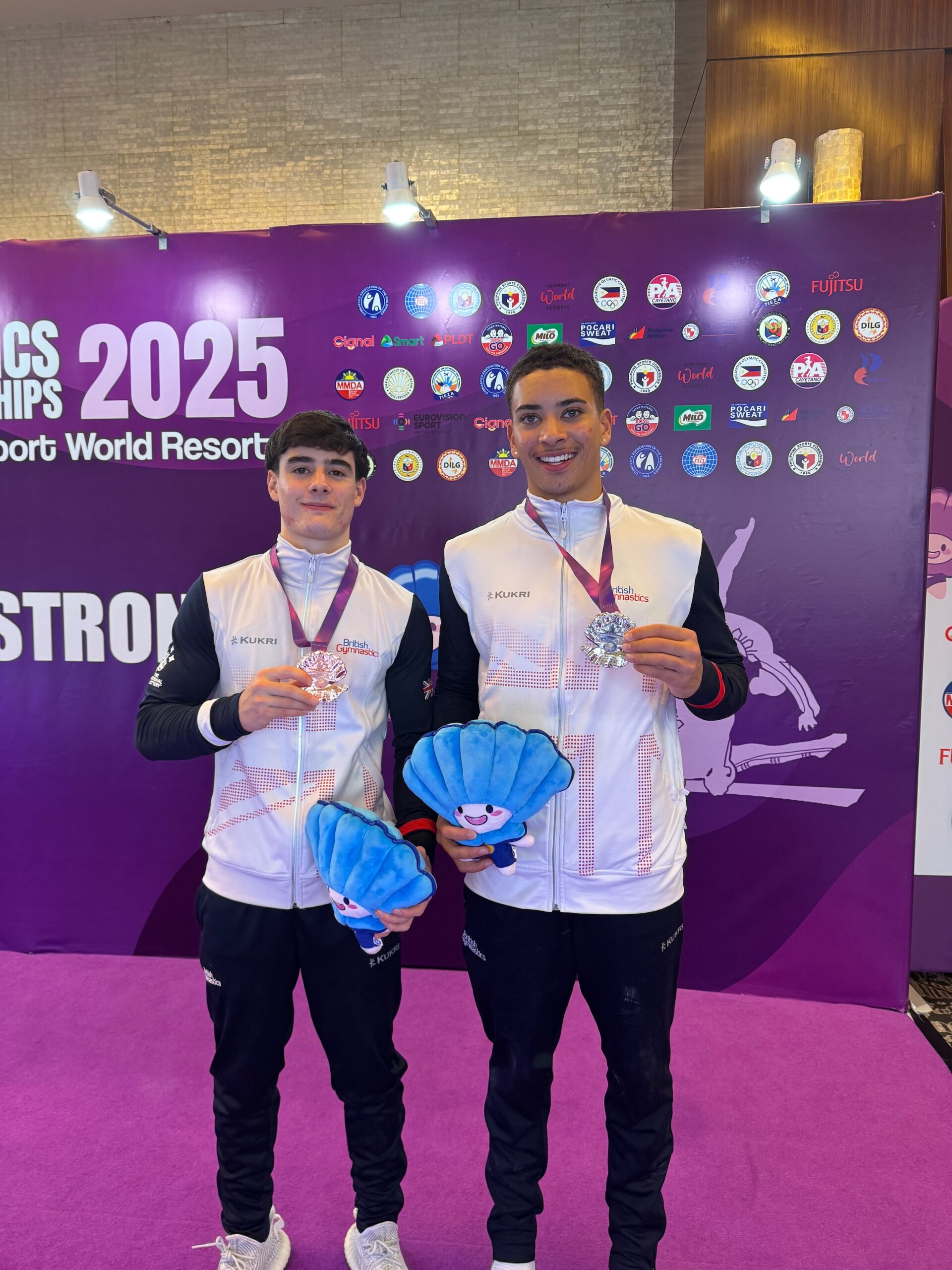Sol Scott and Evan Mcphillips at Junior World championships 2025 after vault medal ceremony